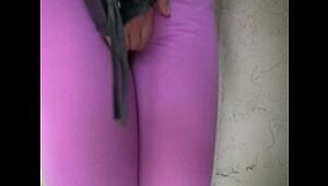 Ash-blonde doll pees her spandex spread trousers outside